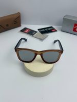 عینک ریبن مدل ریورس rb-r0502s-f عدسی آینه ای دسته آبی شفاف - Image 4
